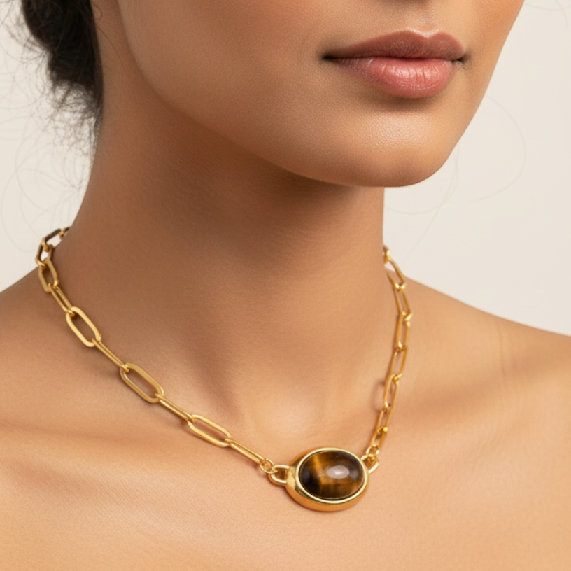 Gold chain necklace with tiger eye stone worn — model shot