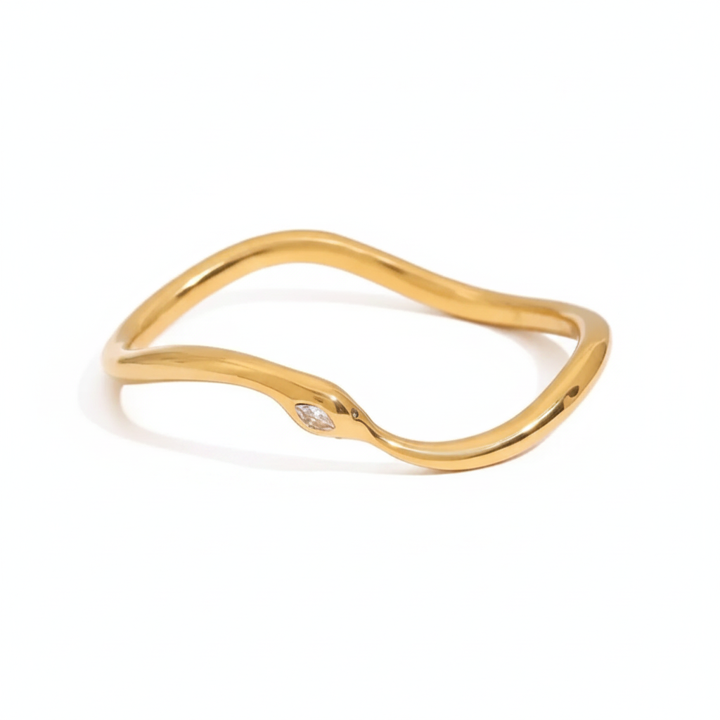 Serpentine Wave Bangle — thin wavy gold bangle with marquise crystal