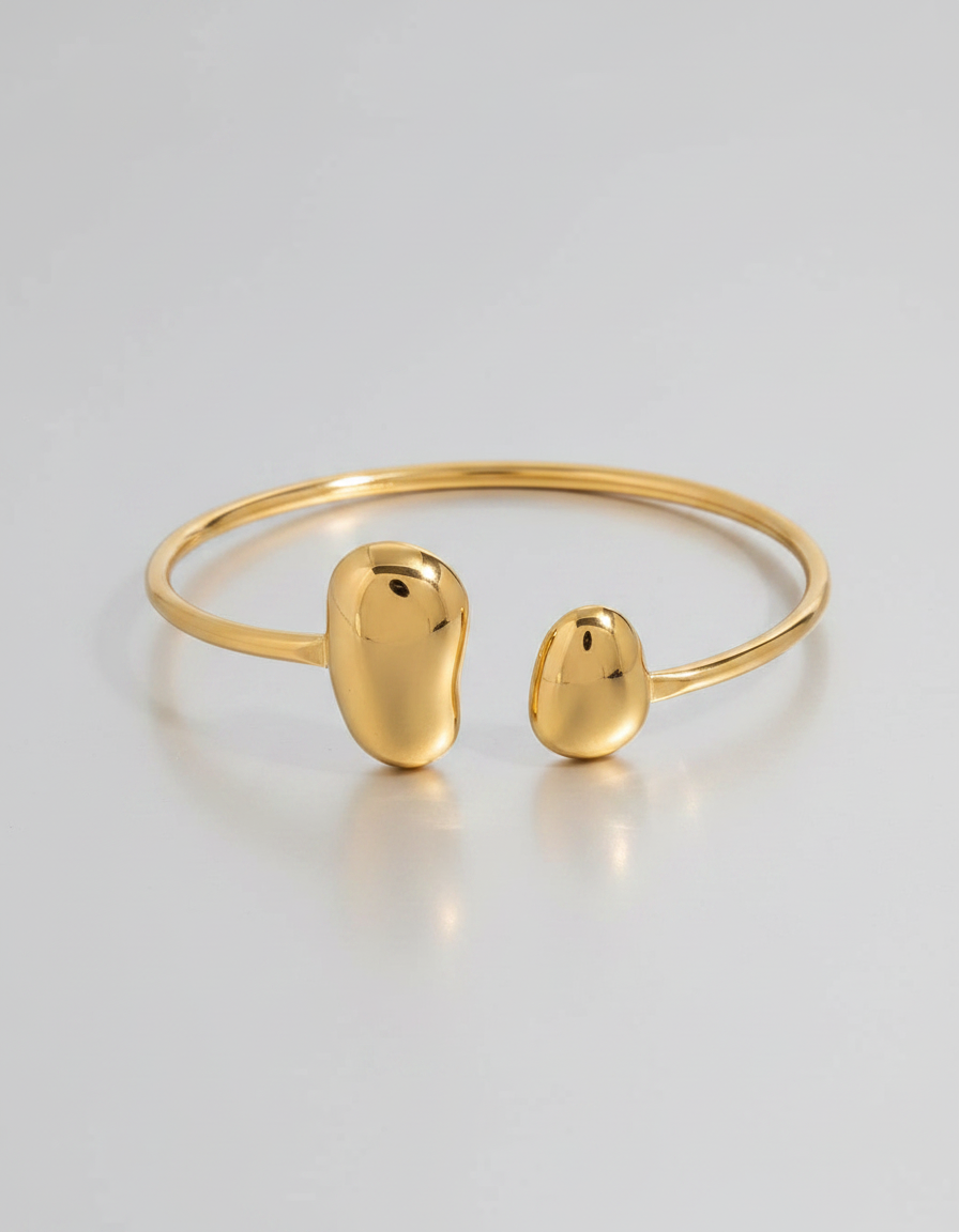 Pebble Duo Open Cuff — 18K gold plated open cuff bangle, studio shot