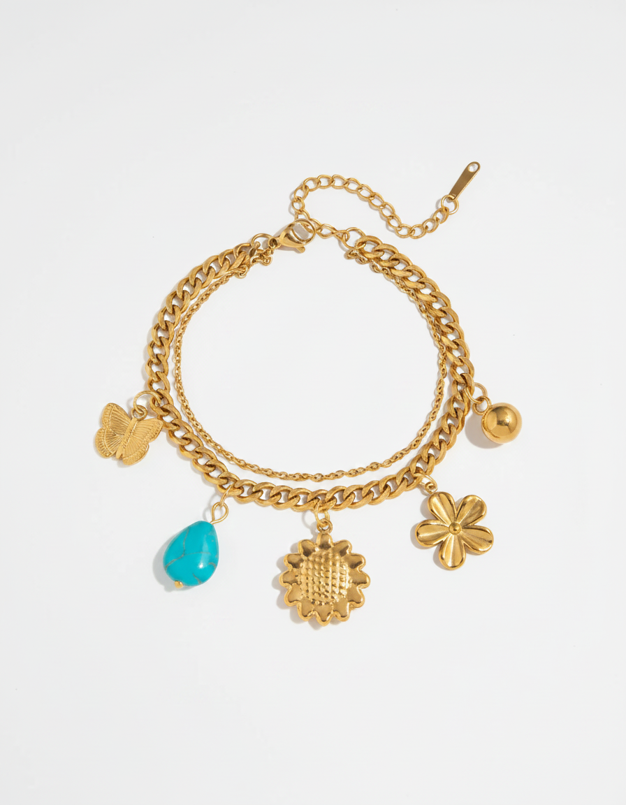 Meadow Charm Layered Bracelet — gold charm bracelet with turquoise drop
