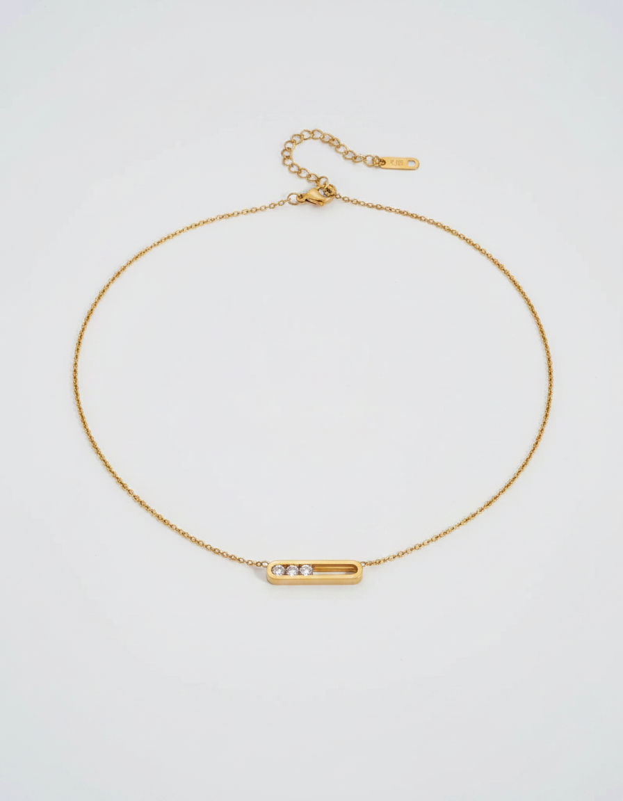 Floating Zircon Capsule Necklace — gold chain with sliding zircon capsule pendant
