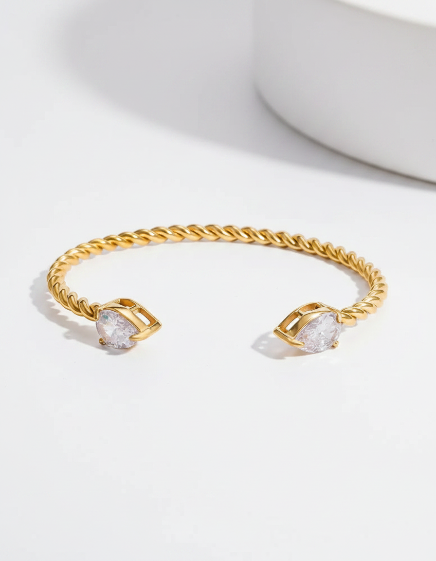 Twisted Rope Zircon Cuff — twisted gold open cuff with pear-cut crystals