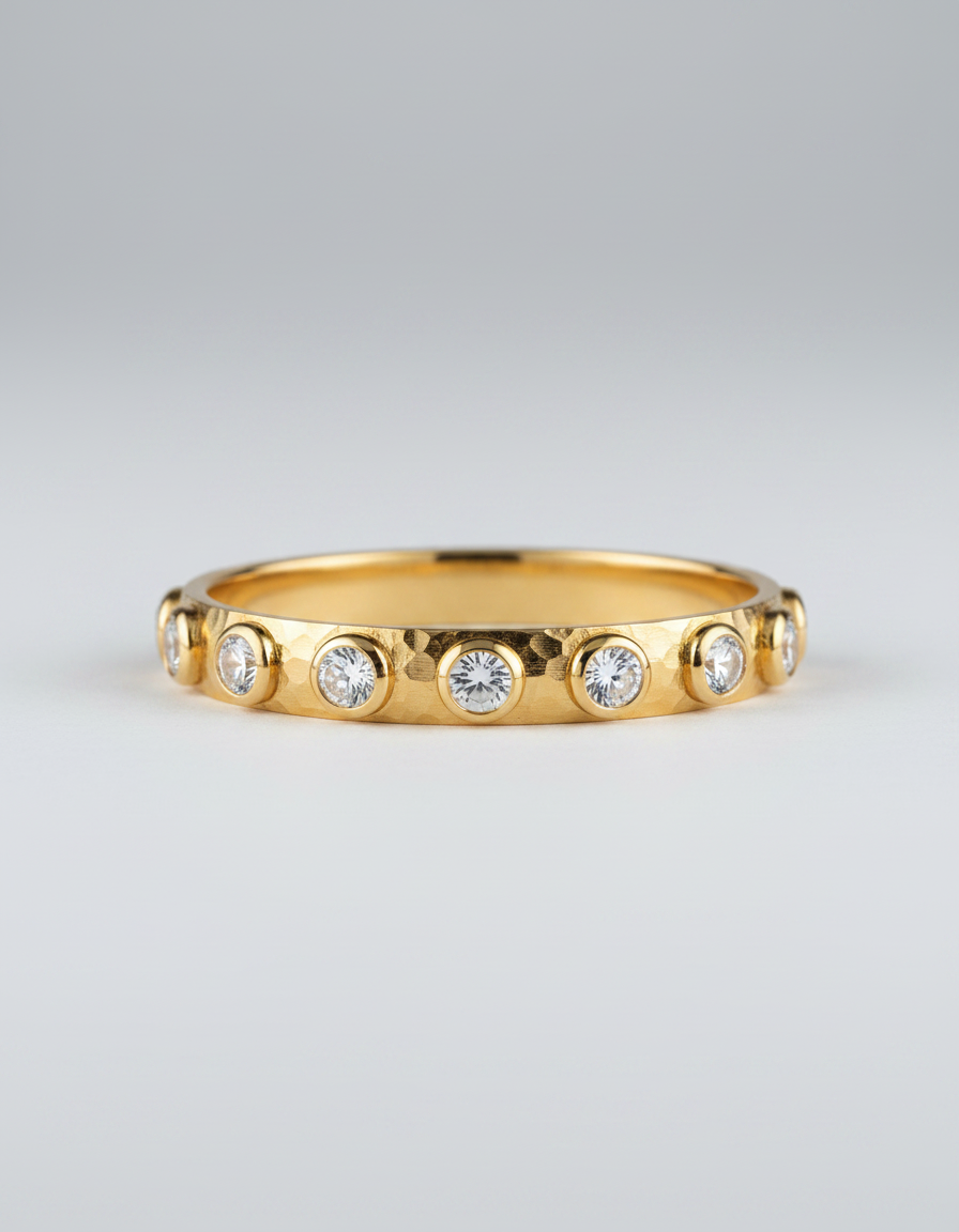 Hammered Halo Zircon Bangle — hammered gold bangle with bezel-set zircons