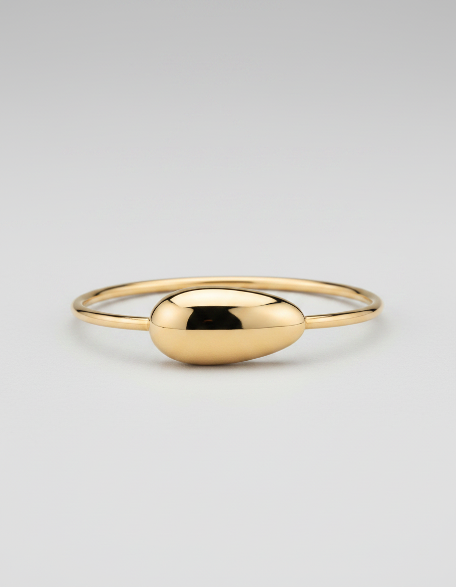 Droplet Signet Bangle — thin gold bangle with oval droplet signet